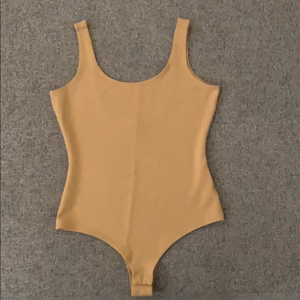 Scoop neck body suit.